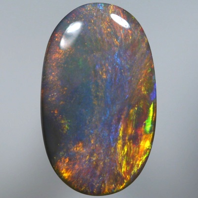 SOLID SEMI BLACK OPAL Burning red and copper over blue